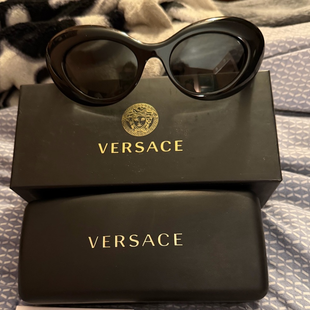 Versace Black Sunglasses. Brand new in the case with the box.